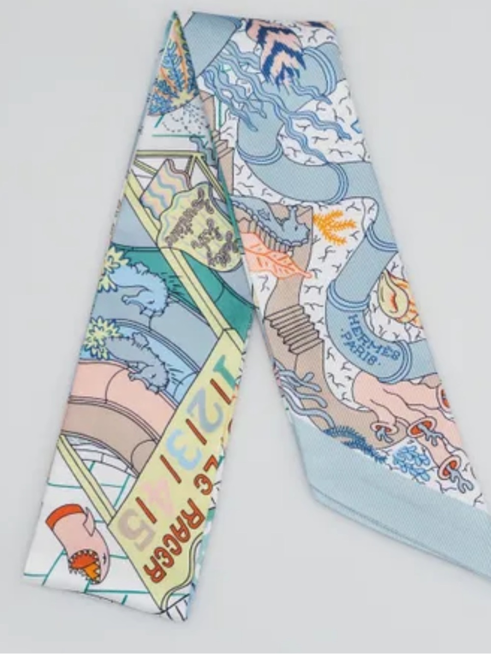 Hermes. Splash Park Blue Slim Twilly Scarf